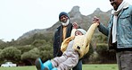 Family, swinging and outdoor fun with grandfather, dad and child happy outdoor in park. Care, African senior man and father with young kid and smile playing in a field on holiday together in nature