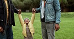 Family, fun swinging and park walk with grandfather, dad and child happy outdoor with youth. Care, African senior man and father with young kid and smile playing in a field on holiday together