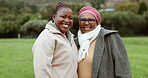 Mother, face and happy black woman in park with parent in countryside nature in portrait together. Family, smile and mom with child smiling, bonding or enjoying holiday vacation with kid, joy or care