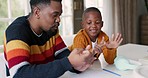 Black family, count on hands and father with child for education, learning and mathematics lesson at home. School, academic and happy dad teaching boy at table for development, homework and knowledge