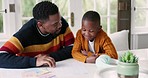 Black family, reading and father with child for education, learning and creative lesson at home. School, academic and happy dad teaching boy at table writing for development, homework and studying