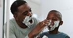 Shaving, cream and father with child in bathroom for grooming, beauty routine and wellness. Black family, happy and dad and kid with shave foam or soap for facial, hygiene and quality time at home