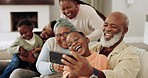 Family, selfie and happy on sofa at home with mother, grandparents and children together. Social media, profile picture and love with mom, elderly people and kids with laugh, care and parent support