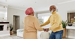 Senior African couple, dance and house in living room with romance, celebration or smile for bonding. Elderly black woman, man and happy for dancing, moving and steps with love in lounge at apartment