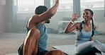 Dumbbell, fitness and high five with couple in gym for workout, motivation and health. Personal trainer, exercise and support with man and woman training for wellness, performance and challenge