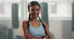 Fitness, smile and arms crossed with woman in gym for workout, wellness and exercise. Health, happy and bodybuilder with portrait of person in sports center for training, muscle and empowerment