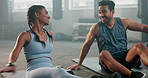 Health, fitness and high five with couple in gym for workout, motivation and dumbbell. Personal trainer, exercise and support with man and woman training for wellness, performance and challenge