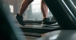 Sneakers, legs and person running on treadmill, fitness and cardio in gym with muscle, energy and workout. Runner, training for race and health with wellness, speed and action with exercise and sport