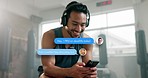 Chat, music and man at the gym with a phone for communication, contact and networking. Happy, fitness and an Asian person with a mobile app for conversation, streaming podcast or training motivation