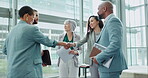 Handshake, meeting and business people greeting on a deal, agreement and collaboration or welcome in an office. Corporate, teamwork and employees shaking hands talking in discussion of partnership