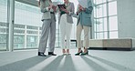 Legs, tablet and business people in an office for a meeting, agenda discussion or schedule planning. Morning, together and corporate employees speaking about a strategy on tech for a collaboration