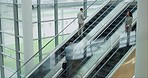 Escalator, office and business people on commute, travel and arrival for corporate career, job or work. Professional, modern workplace and workers on electric stairs for lobby, airport and terminal