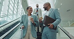 Business people, talking and travel on escalator in airport or coffee break in terminal lounge, lobby or professional employees. Entrepreneur, black woman and man speaking about collaboration or work