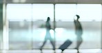 Travel, walking and blur of business people in airport for international trip, transport and departure. Corporate worker, airplane and silhouette of men and women with luggage in terminal for arrival