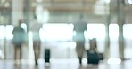 Travel, luggage and blur of business people in airport for international trip, transport and departure. Corporate worker, airplane and silhouette of men and women walking in terminal for arrival