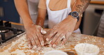 Hands, learning and father baking with child in a kitchen table together to prepare cookies or biscuits recipe at home. Development, parent and dad teaching or helping kid cooking in a house