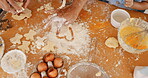 Hands, heart and flour with a family baking in the kitchen of their home together closeup from above. Food, cooking and ingredients with people learning about meal preparation for child development