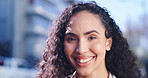 Face, smile and happy with a woman in the city during the day on a commute for travel in summer. Portrait, street and headshot with an attractive young female tourist in an urban town to explore