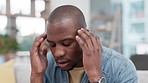 Stress, headache and black man on sofa with temple massage for brain fog in his home. Anxiety, migraine and African male frustrated by vertigo, worry or mental health, worry or crisis in living room