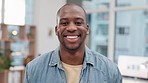 Business, portrait and happy black man in office laughing, good mood or confident in workspace. Face, smile and young male entrepreneur excited for startup, company or agency with positive mindset