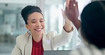 Happy business woman, high five and meeting for interview, teamwork or collaboration at office. Female person or employer touching hands in hiring success, team building or recruiting at workplace