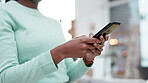 Woman, hands and typing on smartphone in home, reading social media notification or subscription online. Closeup of female person on cellphone to download mobile games, search digital network and app