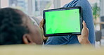 Person, tablet and green mockup in home to watch movies, subscription blog and streaming multimedia show from the back. Closeup, digital screen and advertising space, tracking markers and app on sofa