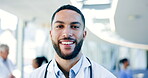 Man, face and doctor smile in hospital for healthcare services, surgery and consulting in Saudi Arabia. Portrait of happy surgeon, therapist and medical professional working with trust in busy clinic