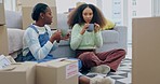 Coffee, moving and lesbian couple in new home, relax on break and discussion on future investment together. Real estate, love and mortgage, lgbt women with boxes on floor at sofa in apartment lounge.