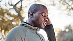 Black man, headache and pain with fitness in park, brain fog and massage temple with health and wellness. Runner outdoor, medical emergency and migraine with stress, challenge and exercise in nature