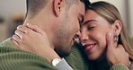 Love, face and happy couple relax, forehead touch and smile at home, bonding and enjoy quality time together. Marriage partner, care and closeup man, woman or people connect on living room sofa  