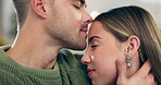 Couple, love and kiss on head on home sofa with happiness, care and support in healthy marriage. Face of man and woman together in a lounge with affection for trust, bonding time or relax on a couch