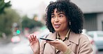 Phone call, smile and gossip with a woman in the city for a commute on a winter morning. Mobile, talking and location with a happy young person in conversation for navigation on an urban street