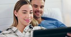 Happy couple, hug and relax in bed with tablet for social media, streaming or watching film in their home. Love, smile and man with woman online for internet, search or checking app in their bedroom