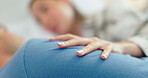 Hand, care and a couple in bed with love, massage or relax together in a house. Bedroom, comfort and a woman rubbing the shoulder of a man in the morning with conversation, bokeh and intimacy closeup