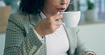 Work, closeup and a woman with coffee in an office for a drink while working at a desk. Corporate, blowing and an employee with a cup, warm beverage or tea in a mug at a workspace in the morning