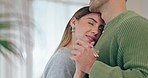 Couple, dance and hug in home for love, support and relax together with happy partner. Face of young woman dancing with man to celebrate anniversary date, romance and care of trust, loyalty and smile