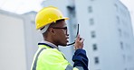Communication, radio and construction worker, man or manager for project management in urban city. Engineering leader, building contractor or african person speaking for safety check on walkie talkie