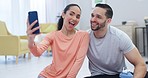 Selfie, couple and home with a smile and profile picture for social media in living room. Marriage, happy and post with love and care in a new house together excited from property and real estate