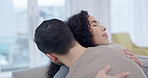 Love, care or couple hugging in home living room bonding together to relax on holiday with support or trust. Intimate embrace, lovers or romantic man with a woman at home with empathy in marriage