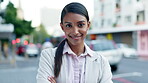 Face, lawyer and woman arms crossed in city, smile and outdoor in urban street. Portrait, confident professional or business attorney, happy worker or expert employee, legal advisor and Indian person