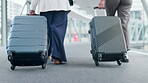 Business people, feet and walking in airport with luggage for journey to convention, conference or employees on work trip or travel. Moving, suitcase and shoes on floor in flight terminal or lobby