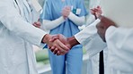 Doctors, nurses and handshake, applause or healthcare support, thank you and success for hospital news or results. Medical worker or hospital staff clapping, shaking hands and clinic congratulations