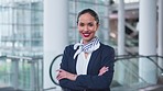 Portrait, flight attendant and arms crossed in airport for travel, journey and help on airplane with professional transport service. Happy, air hostess and working with confidence for global airline