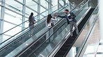 Escalator, office and business people high five on commute, travel and arrival at work for greeting. Modern building, professional and happy men and women on electric stairs for work, career and job