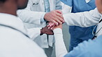 Doctors, hands stack and teamwork for healthcare success, applause and hospital motivation in team building. Nurses, medical professional and group of people together, mission and clapping in clinic