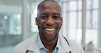 Doctor, smile and face of black man in hospital for medical, professional and consulting. Medicine, healthcare and wellness with portrait of person in clinic for happy, pharmacist and surgery