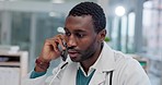 Telehealth, doctor and phone call of a black man in a hospital or clinic for healthcare consultation. Mobile, communication and medical professional with digital advice and expert talking with care