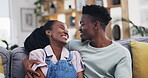 Love, hug or happy black couple in home living room bonding together to relax with support or trust. Sofa, conversation or African man speaking, cuddling or talking to woman with care in marriage