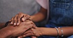 Closeup, home and couple holding hands, empathy and compassion with grief, hope and support. Zoom, people and help with sympathy with love, relationship and marriage with trust, gratitude and care